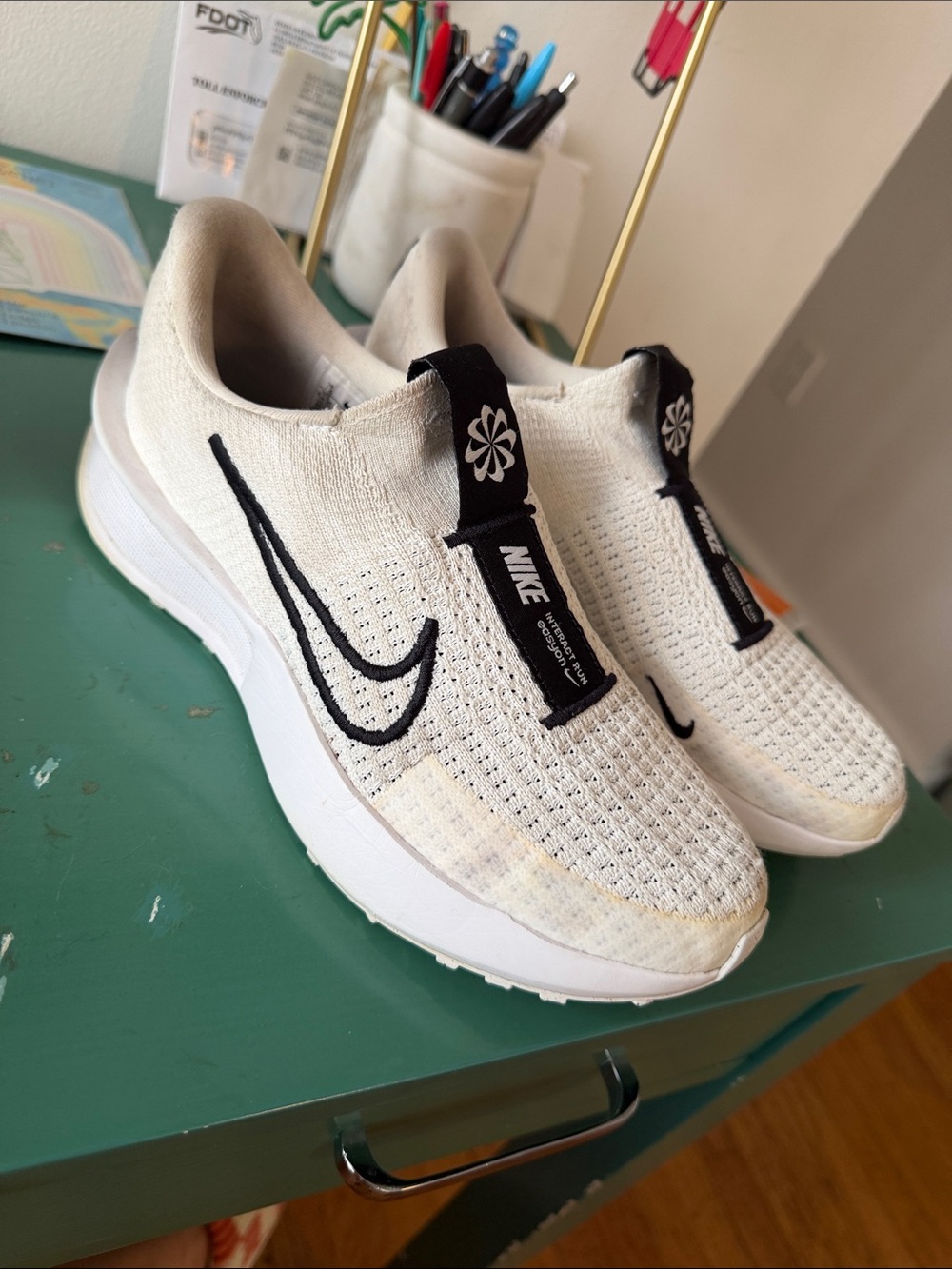 Nike Cream Knit Slip-On Sneakers with Black Swoosh